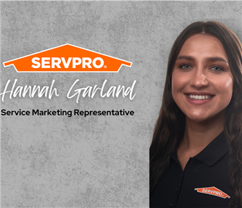 Servpro employee, woman in black polo