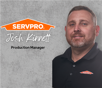 Servpro employee, man in black polo