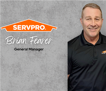 Servpro employee, man in black polo