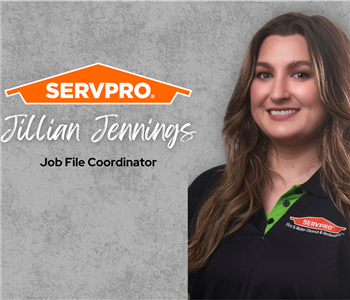 Servpro employee, woman in black polo