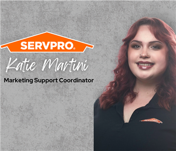 Servpro employee, woman in black polo