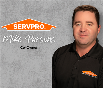 Servpro employee, man in black polo