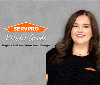 Servpro employee, woman in black polo